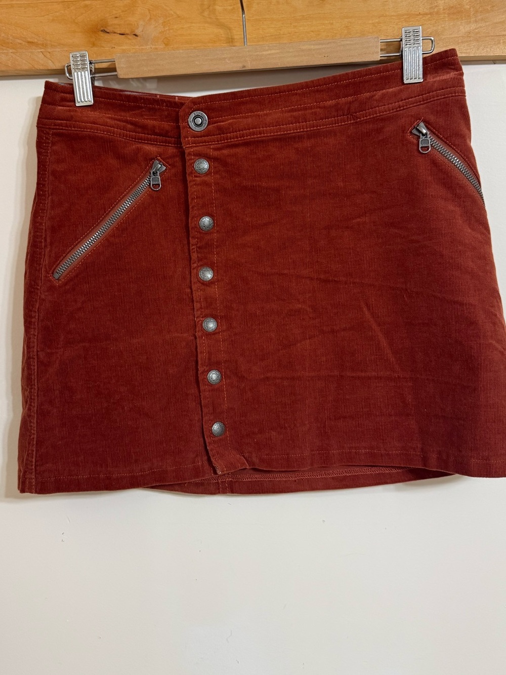 Kuhl Corduroy Button-Front Mini Skirt in Rust
